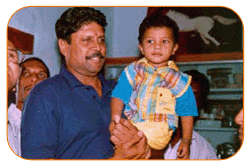 Mr. N Bitra, Friends & Family, With Mr. Kapil Dev & Sri PNV Prasad, Ex. SAAP Chairman, The occasion of Kinetic Boss Vehicle Opening at Bitra's House At Banjara Hills, Road No. 10, On 21st Oct'2002.