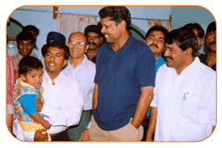 Mr. N Bitra & Bill Bitra, Sri PNV Prasad, Ex.SAAP Chairman With Mr. Kapil Dev. The occasion of Kinetic Boss Vehicle Opening at Bitra's House At Banjara Hills, Road No. 10, On 21st Oct'2002.