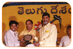 Mr. N Bitra Receiving A memento from Sri. N Chandra Babu Naidu, Ex. Chief Minister of Andhra Pradesh, India.